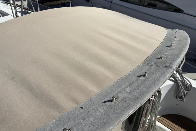 Beneteau Oceanis 400 sailboat bimini top, 1997 model, beige fabric with fasteners.