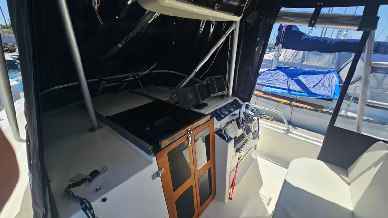 1992 Luhrs Tournament 300 boat interior with steering wheel and control panel.