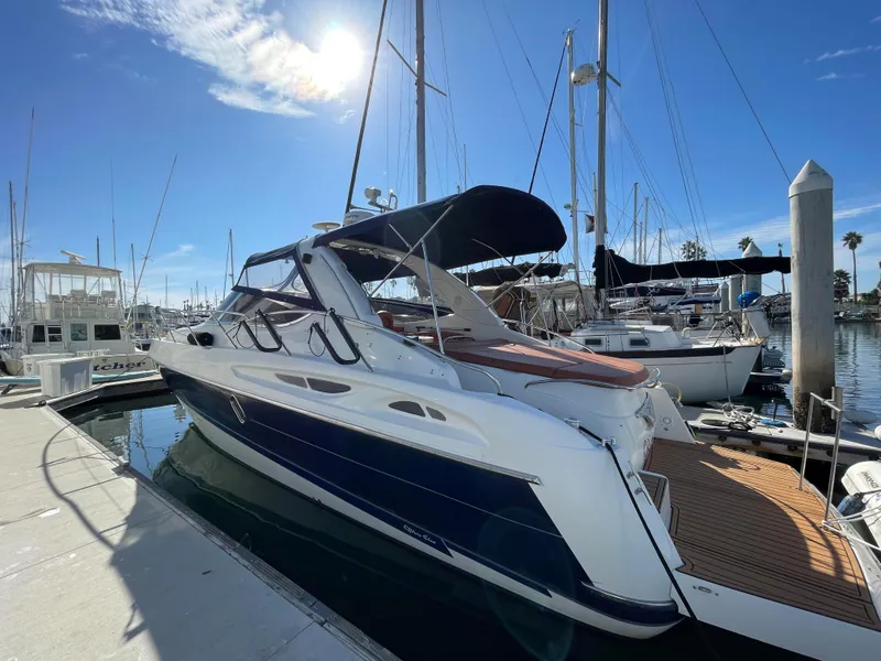 2004 Cranchi Endurance 41 yacht docked in sunny marina.