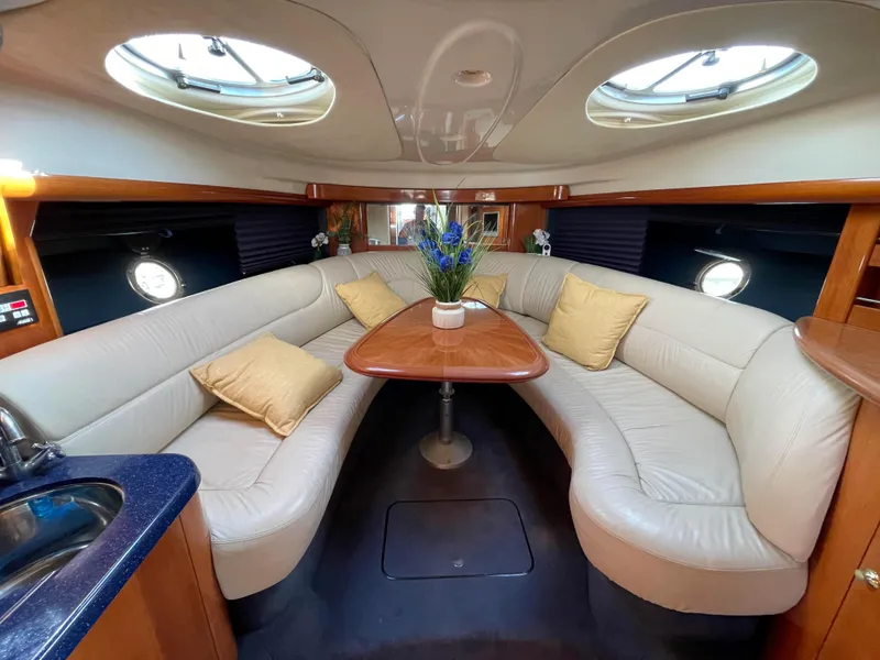 Interior of 2004 Cranchi Endurance 41 yacht with elegant seating area.
