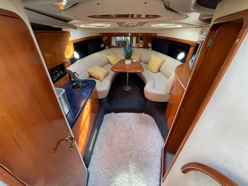Interior of 2004 Cranchi Endurance 41 yacht with elegant seating area.