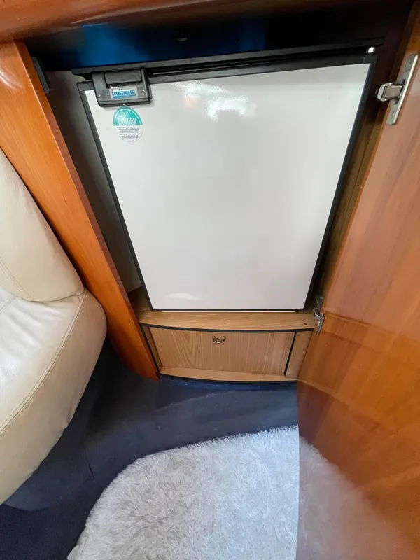 Refrigerator in 2004 Cranchi Endurance 41 boat interior.