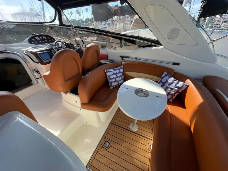 Interior of a 2004 Cranchi Endurance 41 yacht with leather seating and table.