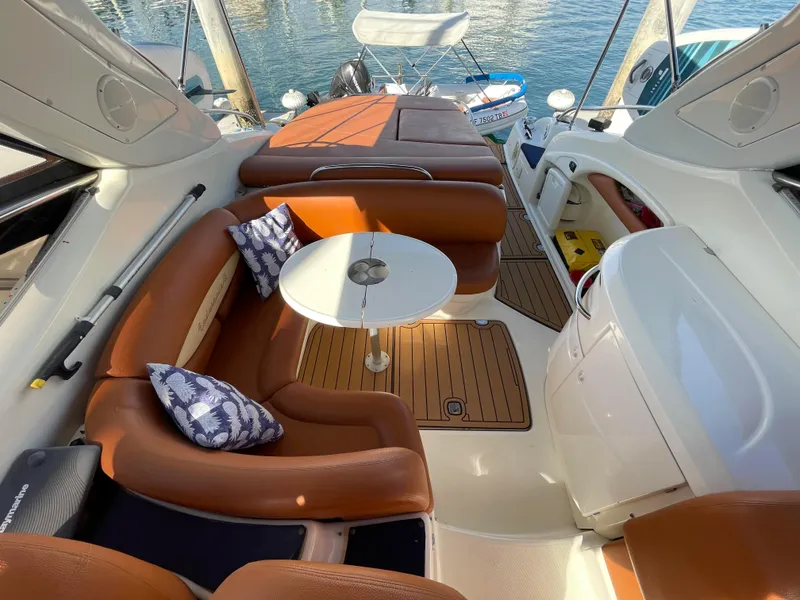 Interior of a 2004 Cranchi Endurance 41 yacht with brown leather seating.