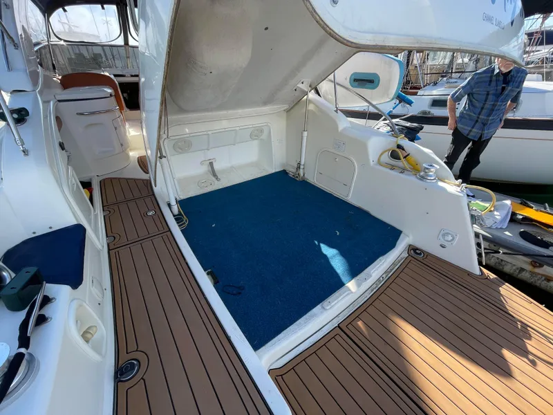 Interior of a 2004 Cranchi Endurance 41 yacht with open storage area.