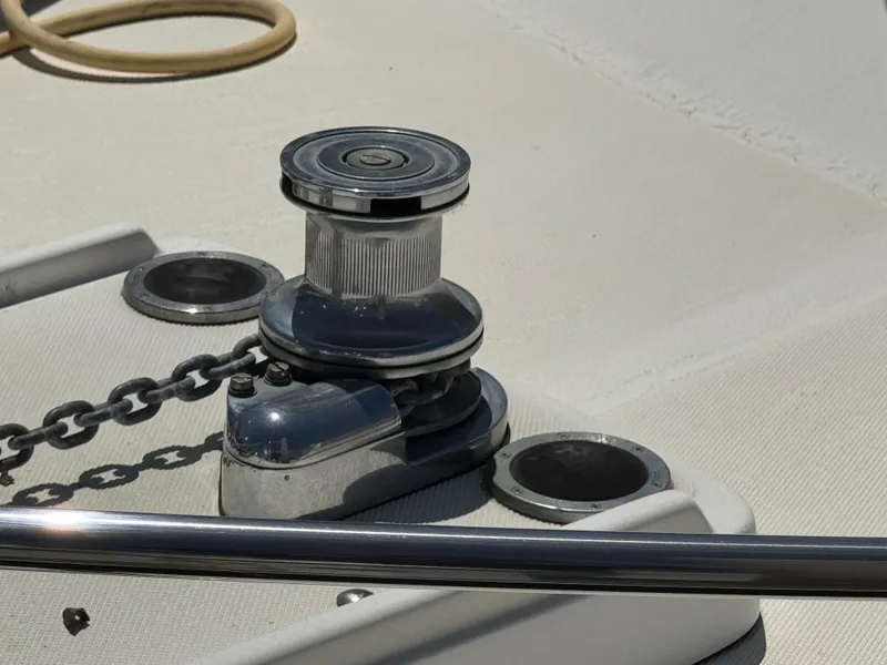 Anchor winch on 2003 Mediterranean 38 Convertible yacht deck.