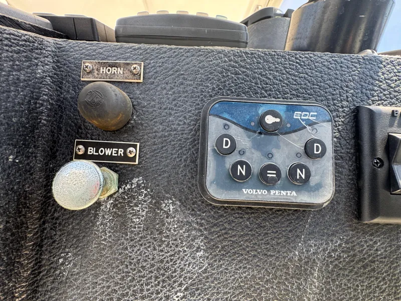 Control panel of a 2003 Mediterranean 38 Convertible boat with Volvo Penta controls.