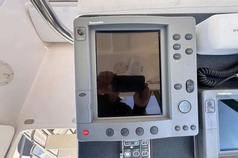 Raymarine navigation system on 2003 Mediterranean 38 Convertible boat dashboard.