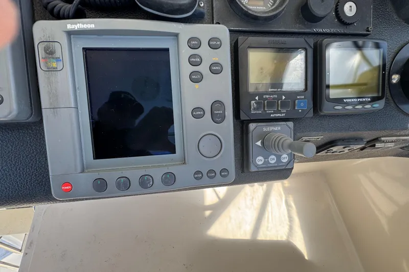 Control panel of a 2003 Mediterranean 38 Convertible boat with navigation equipment.