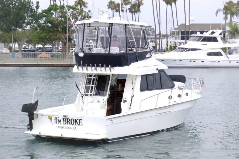 2003 Mediterranean 38 Convertible yacht in marina, Laguna Beach, CA.