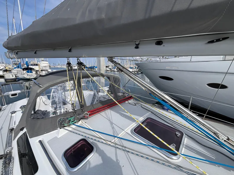Catalina 320 sailboat deck with rigging, docked in marina, 2005 model.