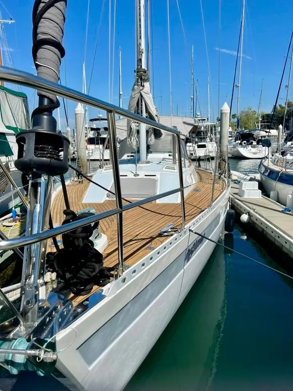 1987 Norseman 400 sailboat docked in marina, showcasing sleek design and wooden deck.