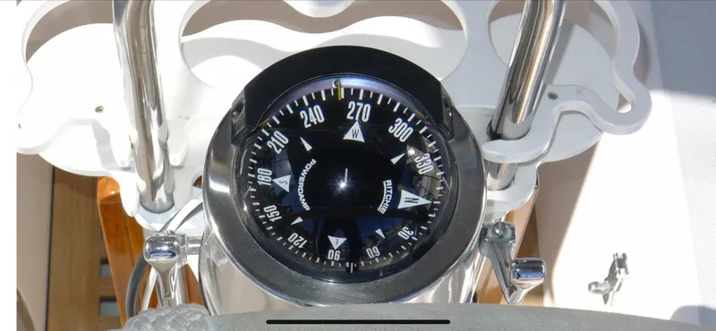 Compass on Norseman 400 yacht, 1987 model, showing direction in nautical setting.