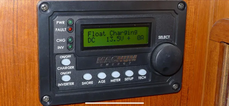 Control panel on a 1987 Norseman 400 displaying float charging status.