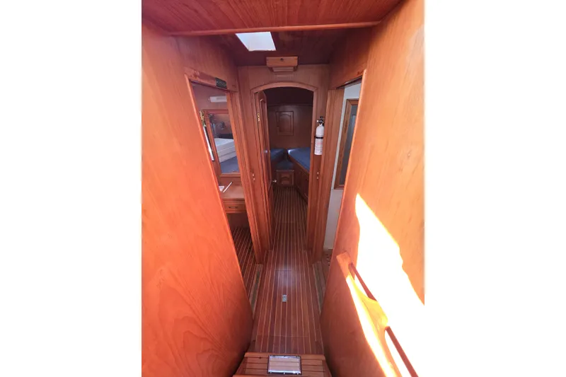 Interior view of 1983 Sea Ranger 45 Sun Deck yacht with wooden finish.