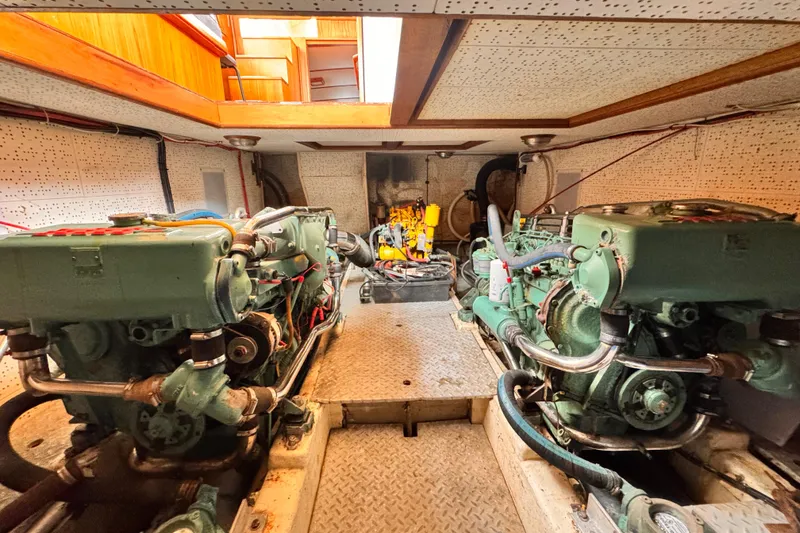 Engine room of 1983 Sea Ranger 45 Sun Deck with dual engines.