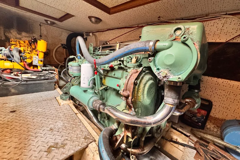Engine room of 1983 Sea Ranger 45 Sun Deck with visible machinery and components.