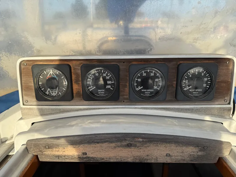 Dashboard of a 1980 Rival 32 boat with instruments.