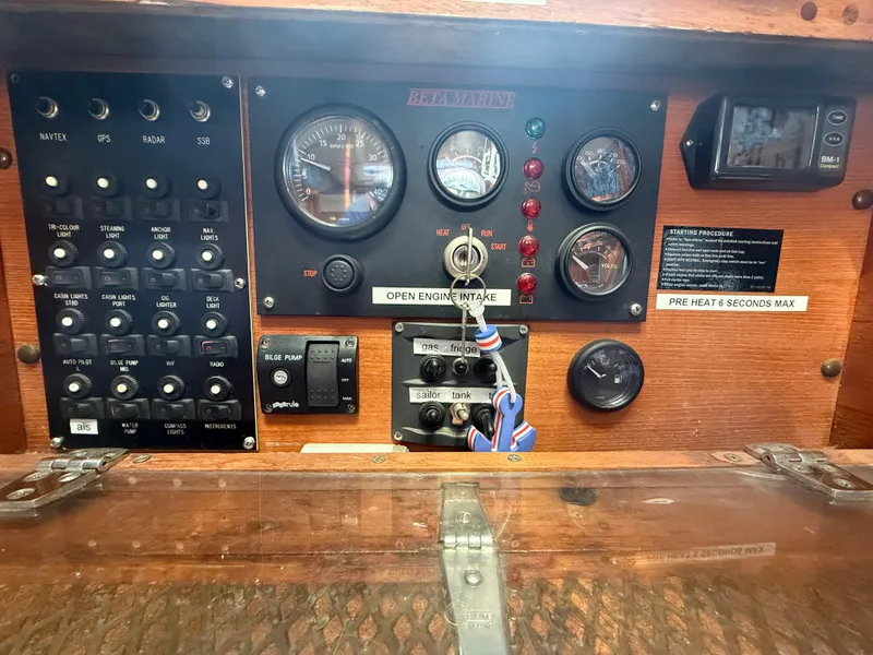 Dashboard of a 1980 Rival 32 boat with instruments and switches.