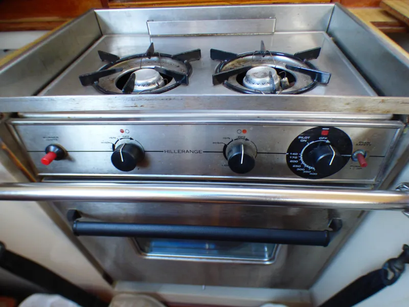 Stainless steel stove with two burners on a 1984 Catalina 36 Sloop yacht.