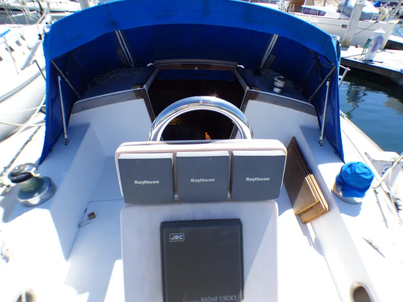 1984 Catalina 36 Sloop cockpit with blue canopy and navigation equipment.