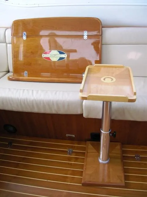 Movable table with interchangeable table tops