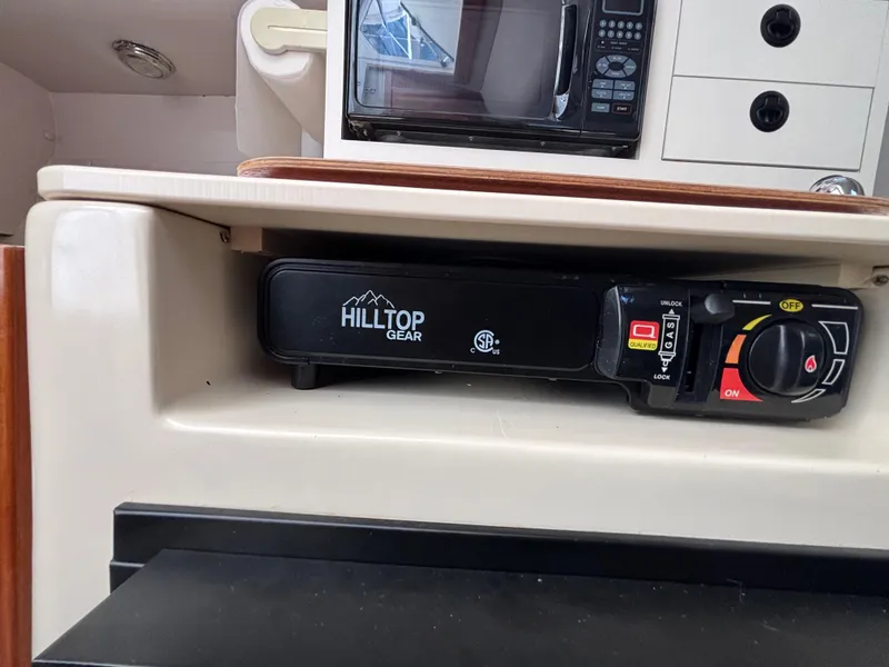 2004 Albin 28 TE interior with Hilltop Gear equipment and microwave.