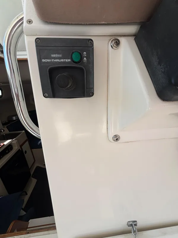 2004 Albin 28 TE boat interior with bow thruster control panel.
