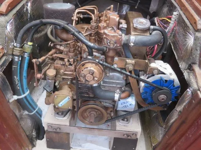 1986 Catalina 34 engine compartment with visible components and wiring.