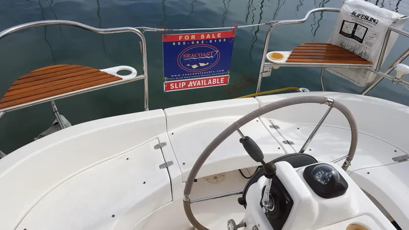 Cockpit rail seats, walk thru transom