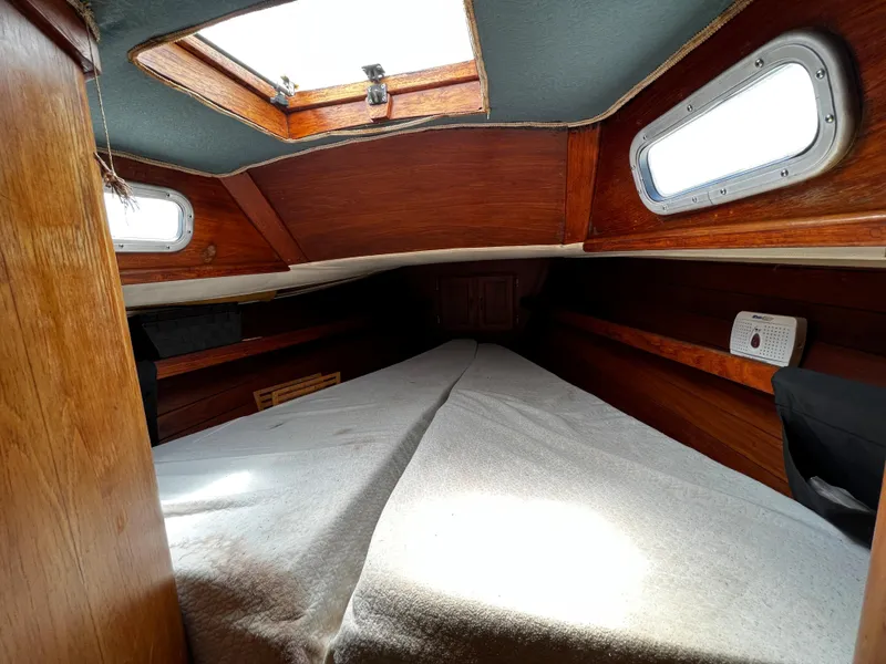 1978 Ericson 35 Sloop cabin interior with wooden finish and natural light.
