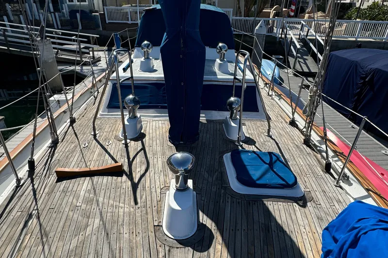 1984 Transpacific Marine Ketch deck with wooden finish and nautical equipment.