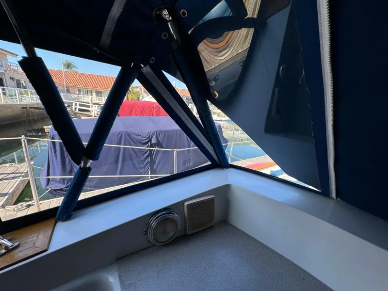 1984 Transpacific Marine Ketch interior view with marina backdrop.