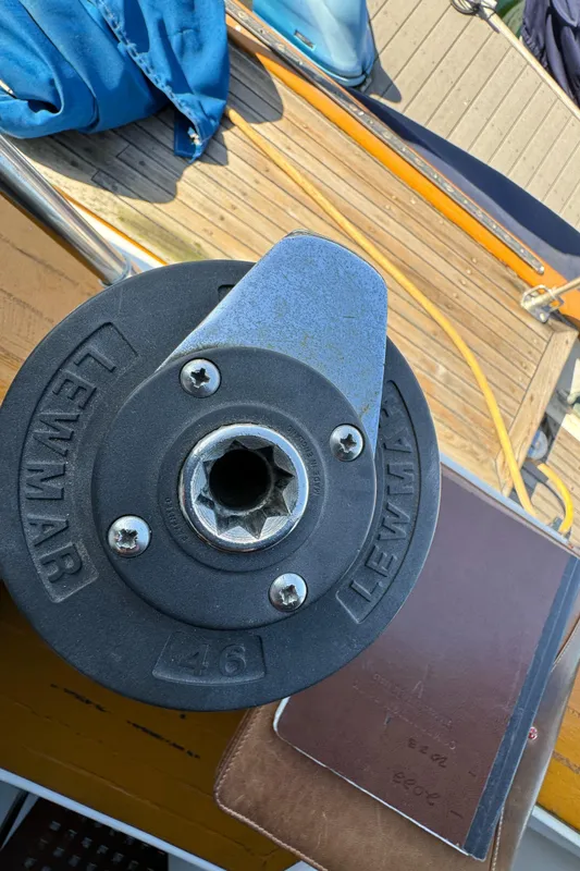 Close-up of a Lewmar winch on a 1984 Transpacific Marine Ketch sailboat deck.