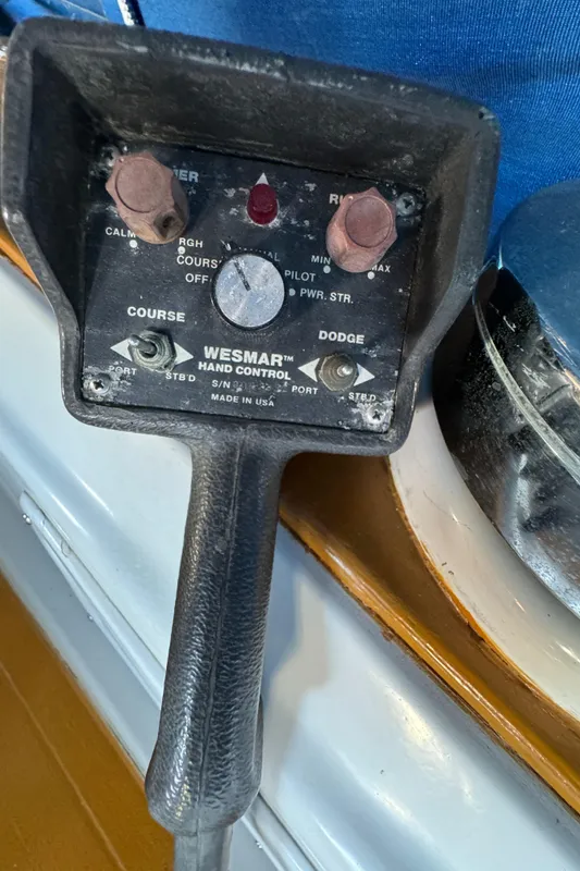 Wesmar hand control on 1984 Transpacific Marine Ketch, featuring course and dodge settings.
