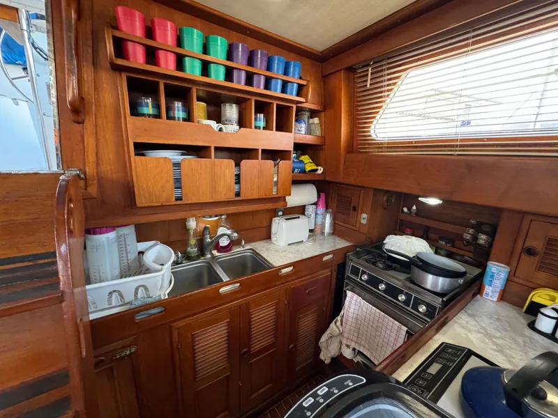 Interior of a 1984 Transpacific Marine Ketch with kitchen.