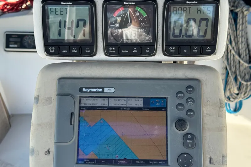 Catalina 42 (1989) sailboat navigation instruments displaying depth, wind, and GPS data.