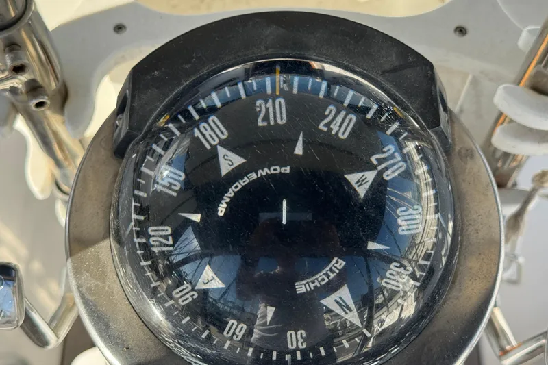 Compass on a 1989 Catalina 42 sailboat, showing directional headings.