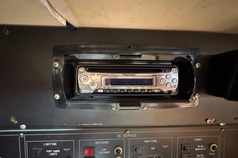 Pioneer stereo system in a 1989 Catalina 42 yacht control panel.