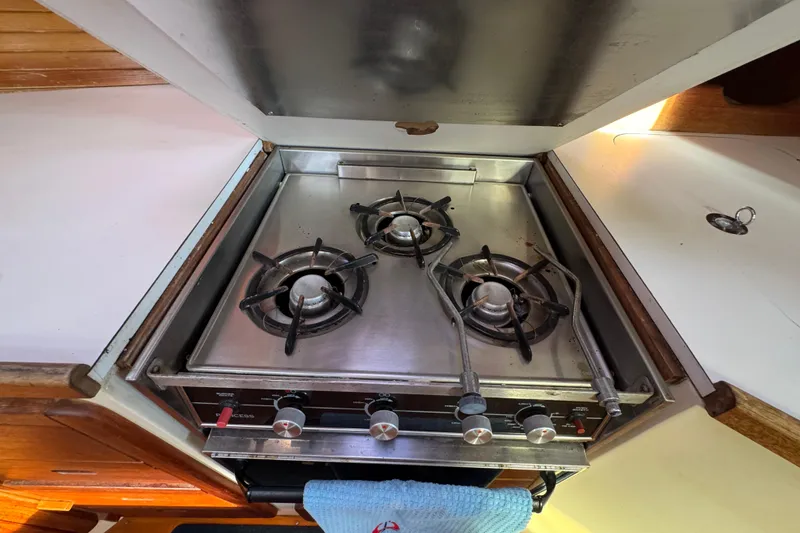 Three-burner stove in 1989 Catalina 42 yacht kitchen.