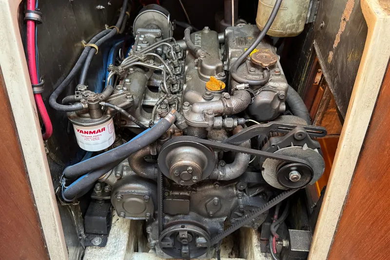 Engine compartment of a 1989 Catalina 42 sailboat with Yanmar diesel engine.