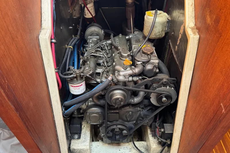 Engine compartment of a 1989 Catalina 42 sailboat with Yanmar diesel engine.