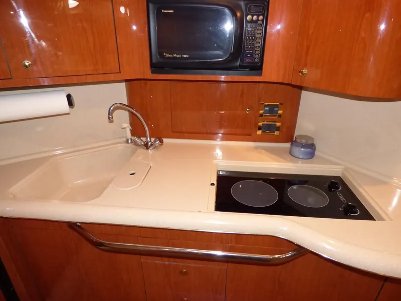 Opens to stove-sink