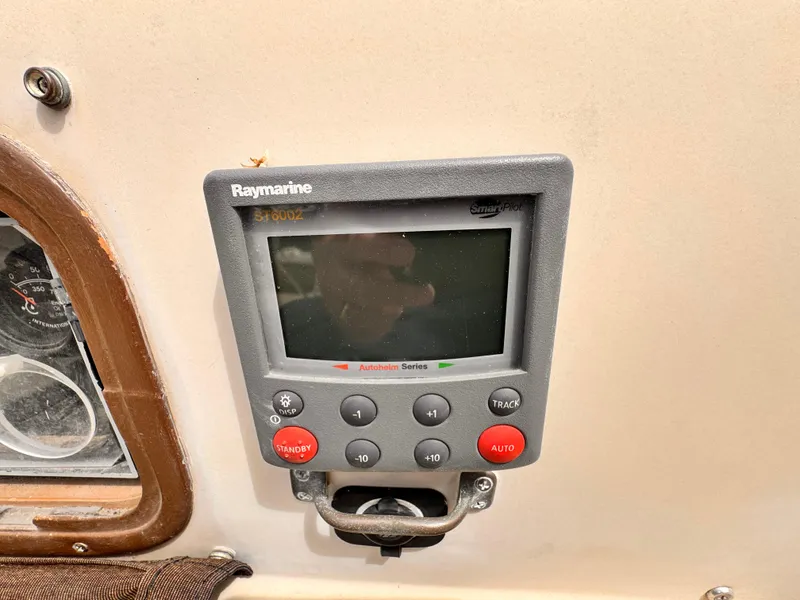 Raymarine ST6002 autopilot on 1978 Islander 36 sailboat dashboard.