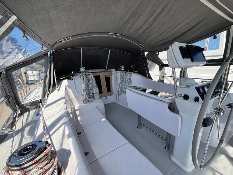 2019 Catalina 385 sailboat cockpit with modern navigation equipment and seating.