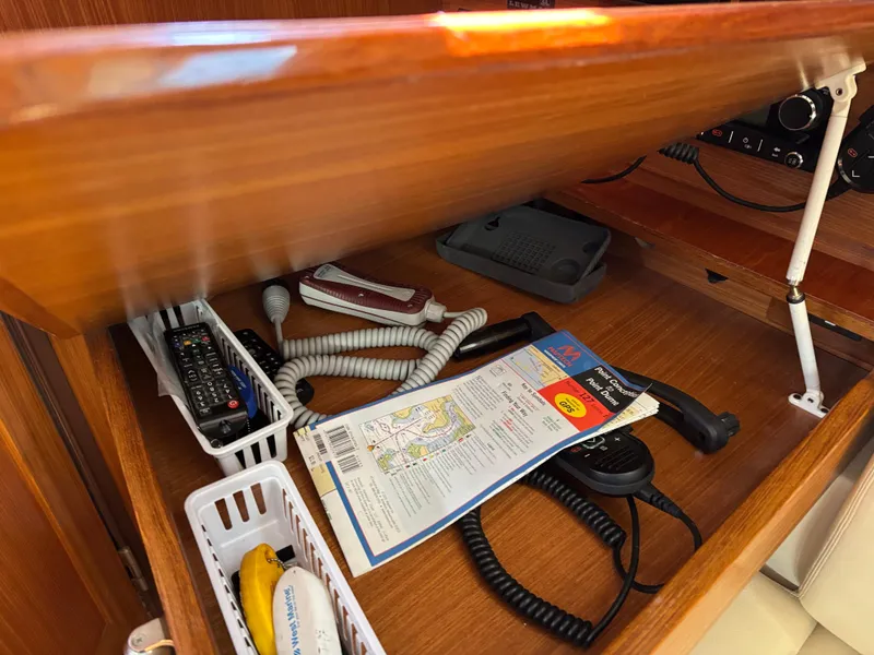 2019 Catalina 385 yacht interior with navigation tools and communication equipment.