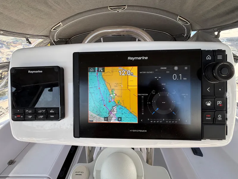 Raymarine navigation system on 2019 Catalina 385 sailboat, displaying nautical charts and controls.