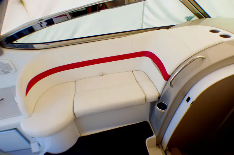 2003 Formula 37 PC boat interior with white seating and red accent stripe.