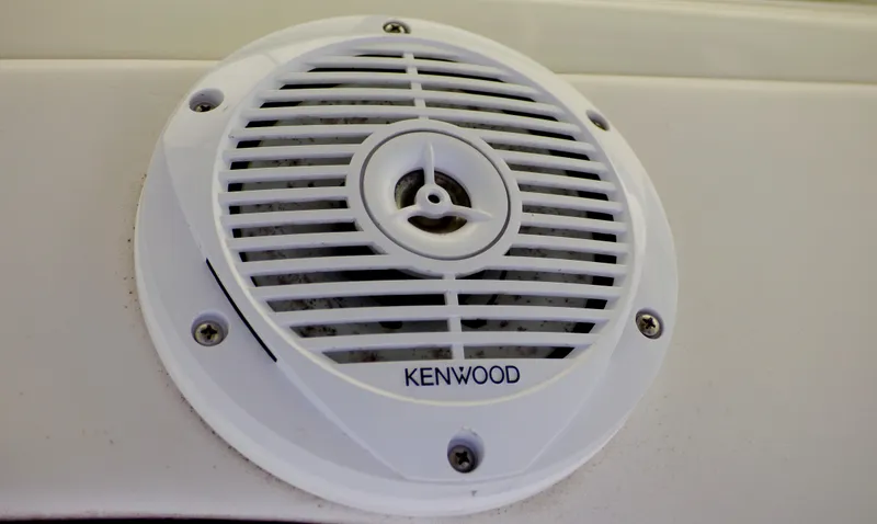 Kenwood speaker on 2003 Formula 37 PC boat, white grille design.