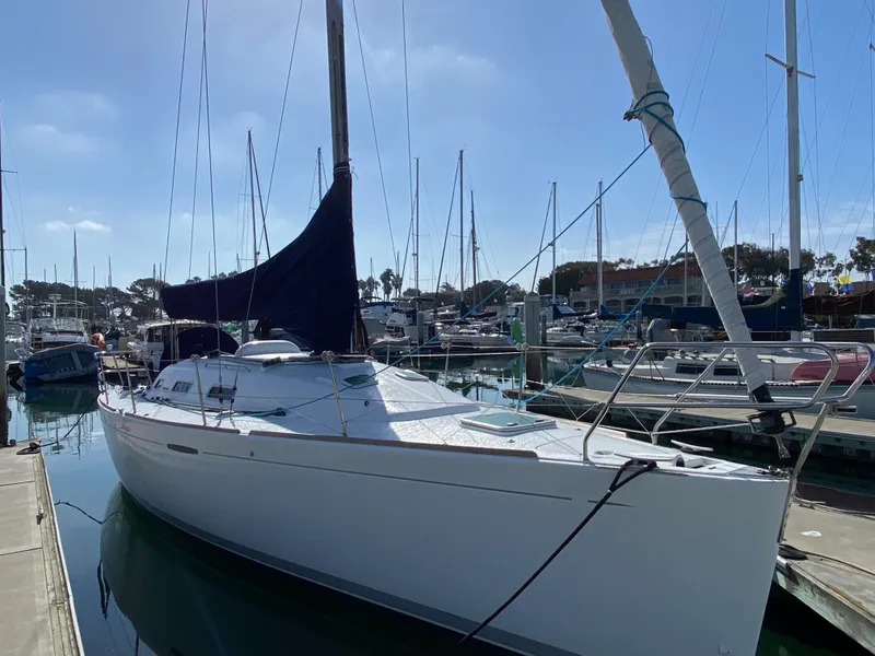2004 Beneteau 36.7 sailboat docked in a marina.